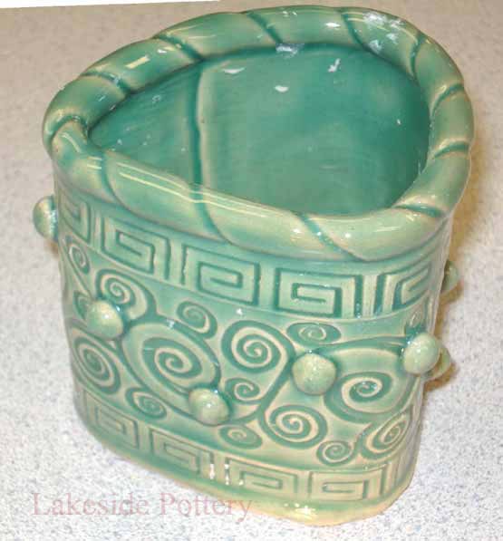 Textured hand-built ceramic container