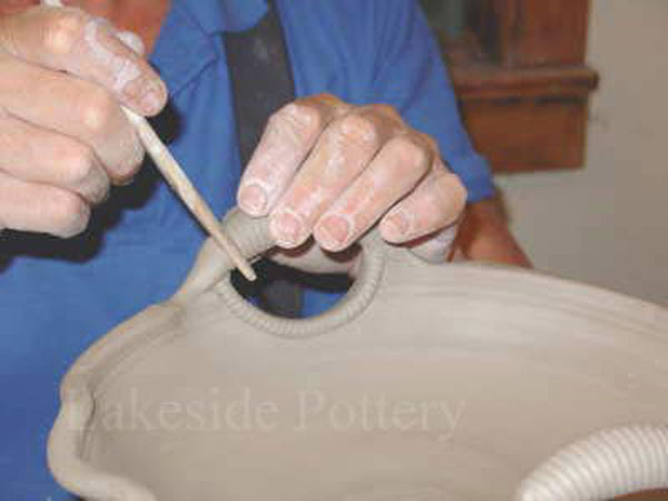 Alered bowl with handles
