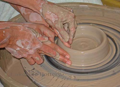 hand-on pottery teaching - tactile and rewarding experience