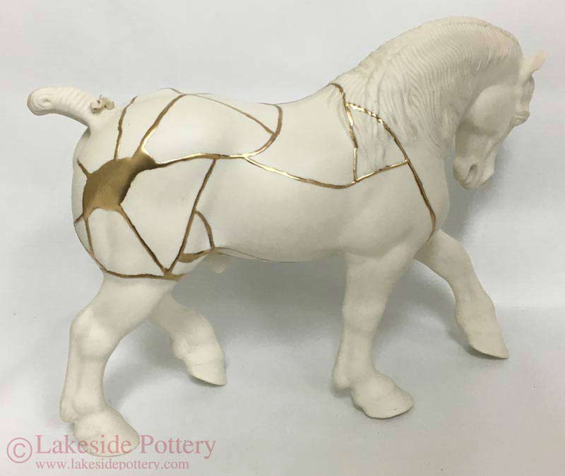 Ceramic horse figurine kintsugi repair