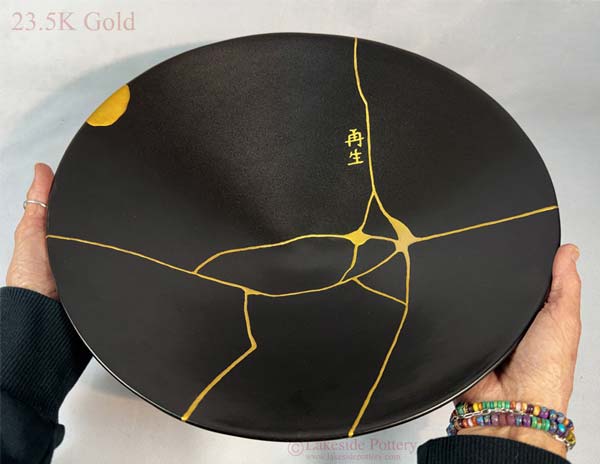 Large gold Kintsugi bowl with rebirth symbol