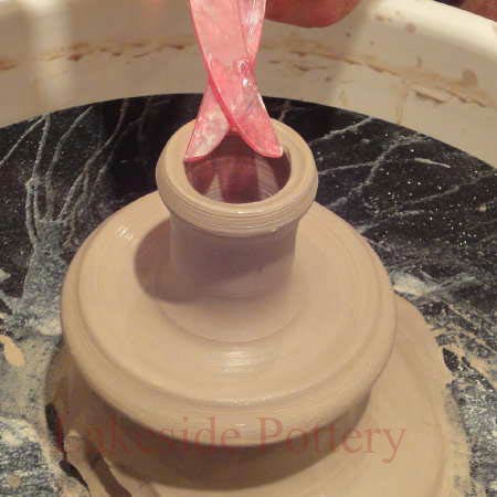 making missing vase rim on the pottery wheel