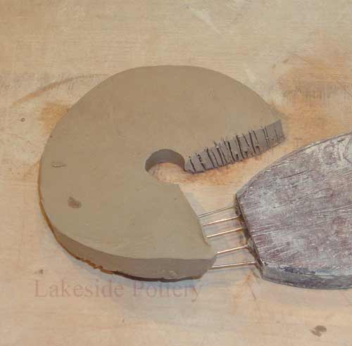miter, score and slip before attaching clay edges