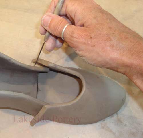 mark and remove excess clay 