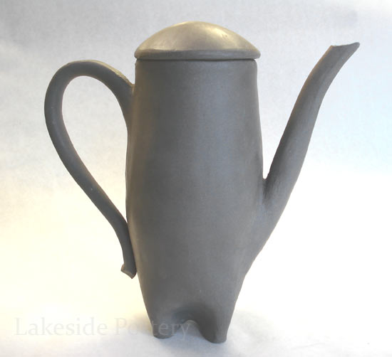 Tall elegant ceramic pitcher