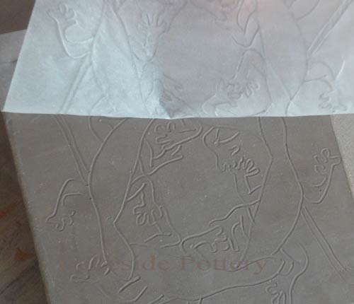 design on leather hard clay for sgraffito