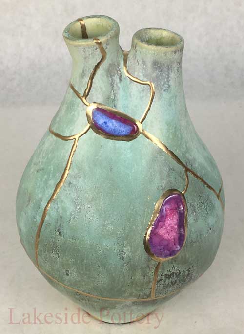 Kintsugi heart vase repair using gem stone - commissioned  project