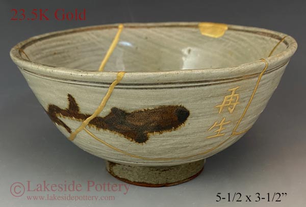 Japanese gold Kintsugi bowl with "Rebirth"