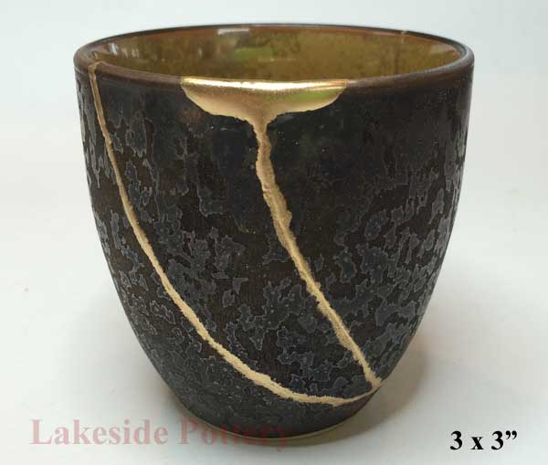 Black gold Kintsugi cup