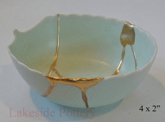 celadon japanese bowl with kintsugi repair