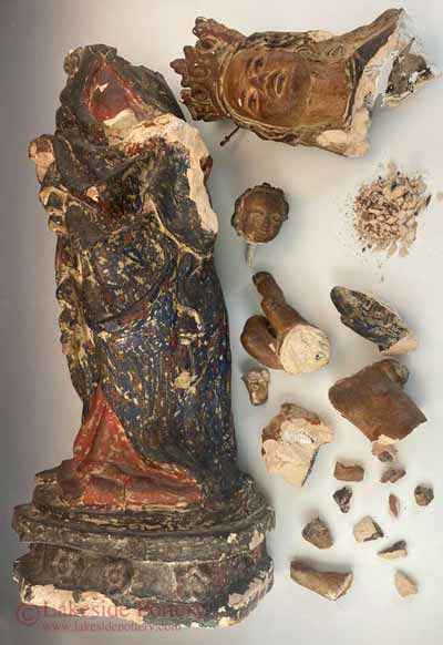 Madonna and child broken ceramic statue