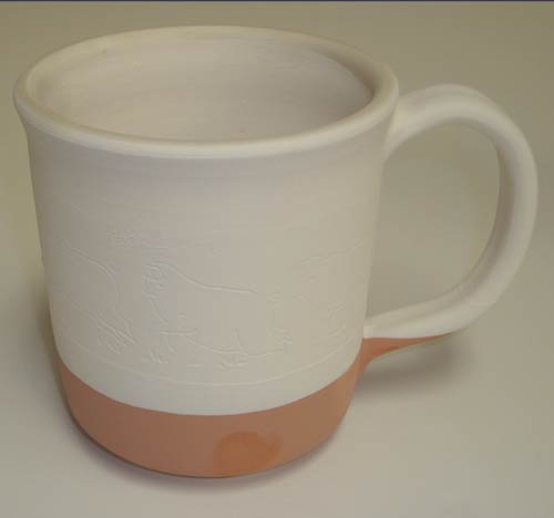 mug glazed with two glazes - clear and brown glazes