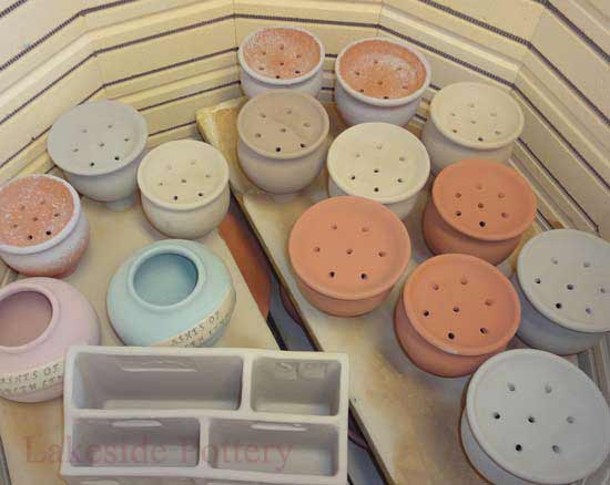 glazed pots in the ready  to be fired