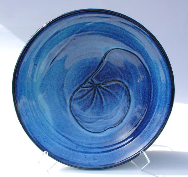 Large platter with altered rim and surface texture and multiple colors
