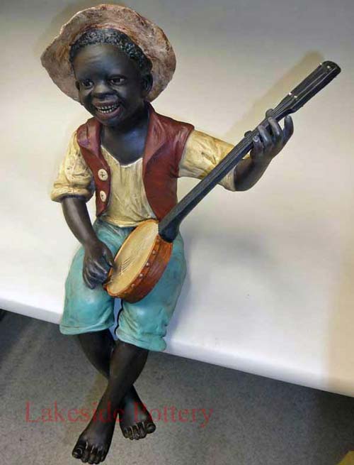 African boy terra cotta sculpture restored