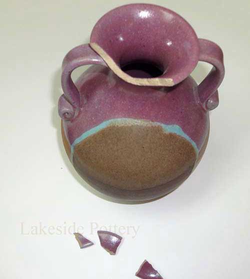 Broken stoneware vase