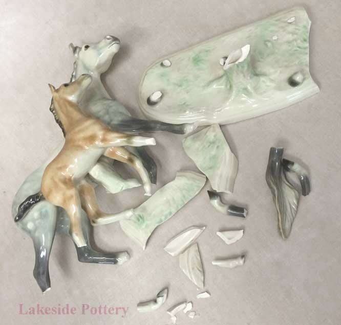 Broken ceramic horse and foal