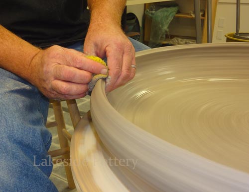 Throwing a large platter  in stages adding coils