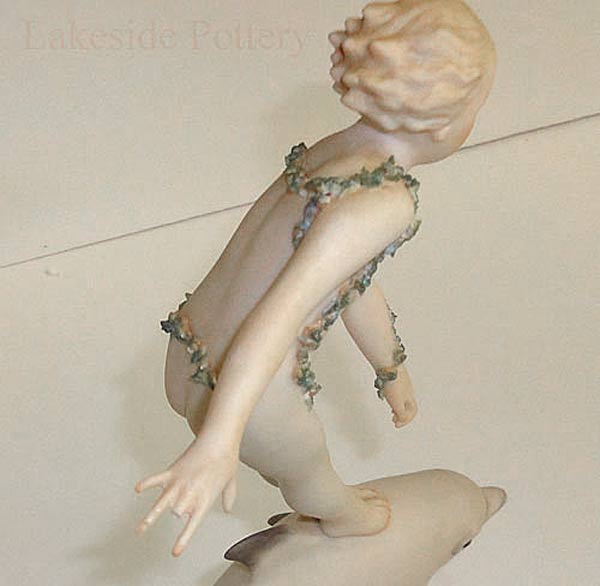 Cybis arion boy ceramic figuring with missing finger