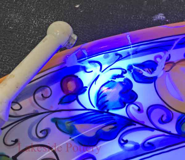 Inspect surface with UV light or a spot light for any surface defects 