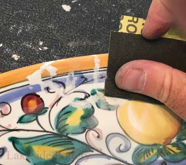 Sand second layer by hand with long strokes using grit 220, then grit 400 and finish with grit 3600.