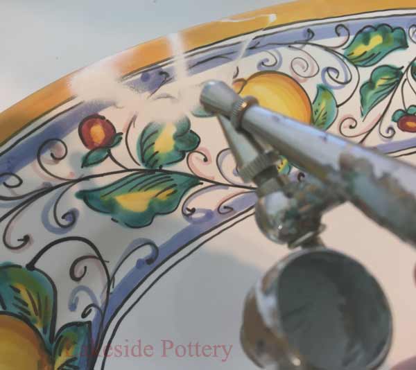 Airbrush over the repair line